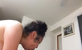 Curvy Asian wife sucking cock in 69-pose